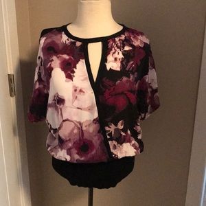 Purple and white flowered blouse